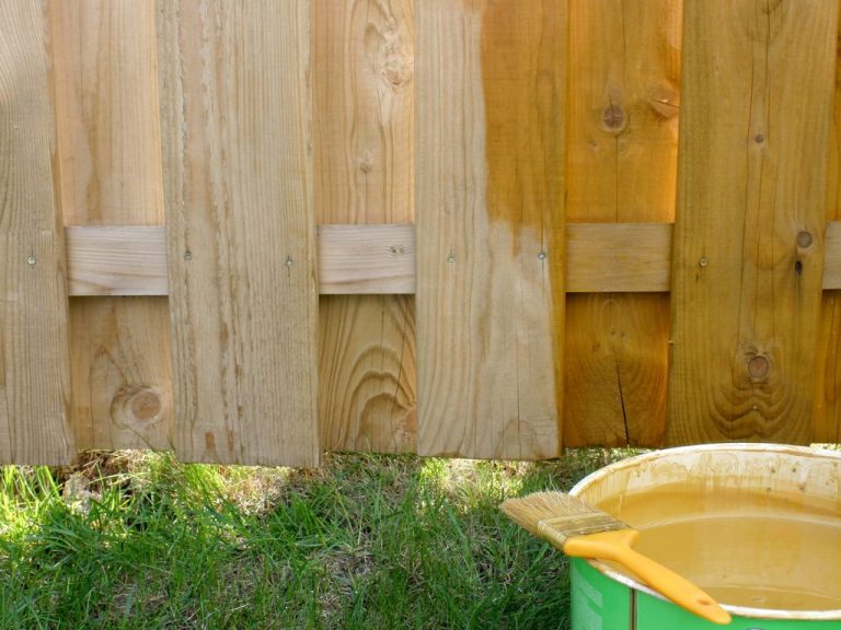 How Do Fence Painting Services Protect Your Fence from Weather Damage?