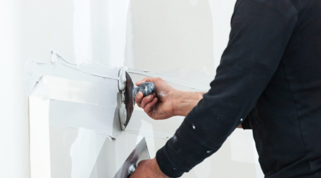 Mysterious Holes Marring Your Walls Unveiling the Solutions Drywall Repair Offers