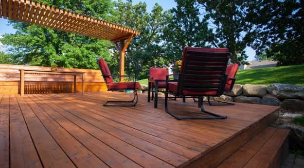 Tired of Replacing How Staining and Sealing Extends the Life of Your Deck